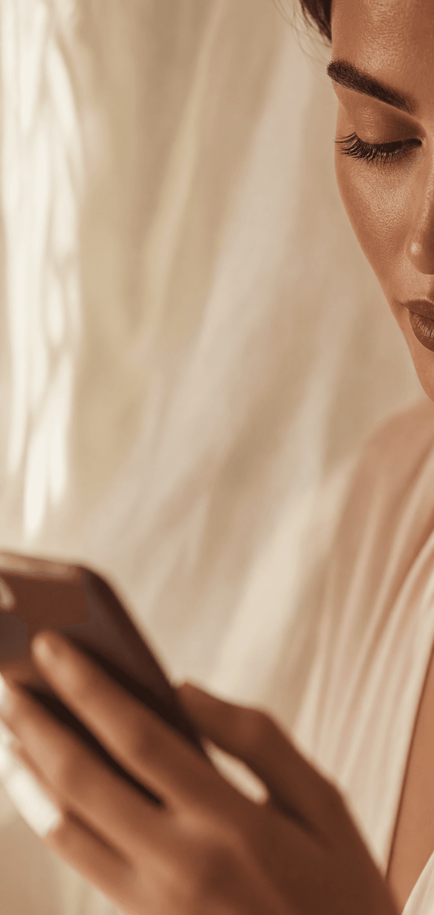 A woman reading about lip blushing on her phone